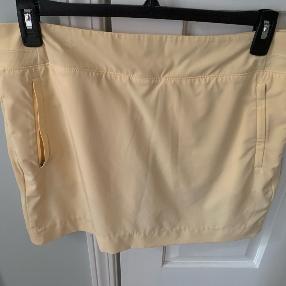 Athleta Skort.  Light yellow. Size 16 Very good condition.